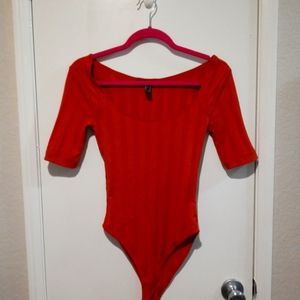 Burnt orange bodysuit never warn